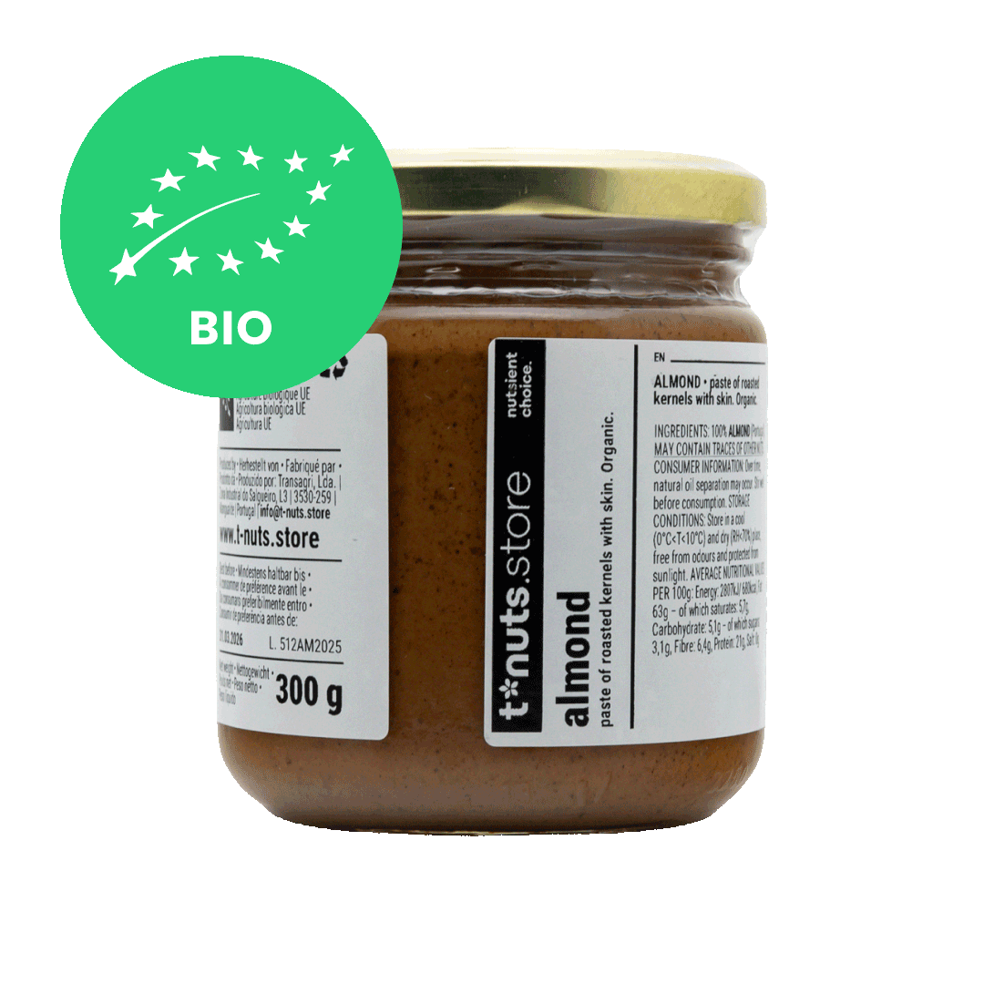 300g glass jar of almond paste with a visible label and organic certification logo on a black background