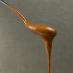 ALMOND • with skin. creamy paste of roasted kernels. no additives.