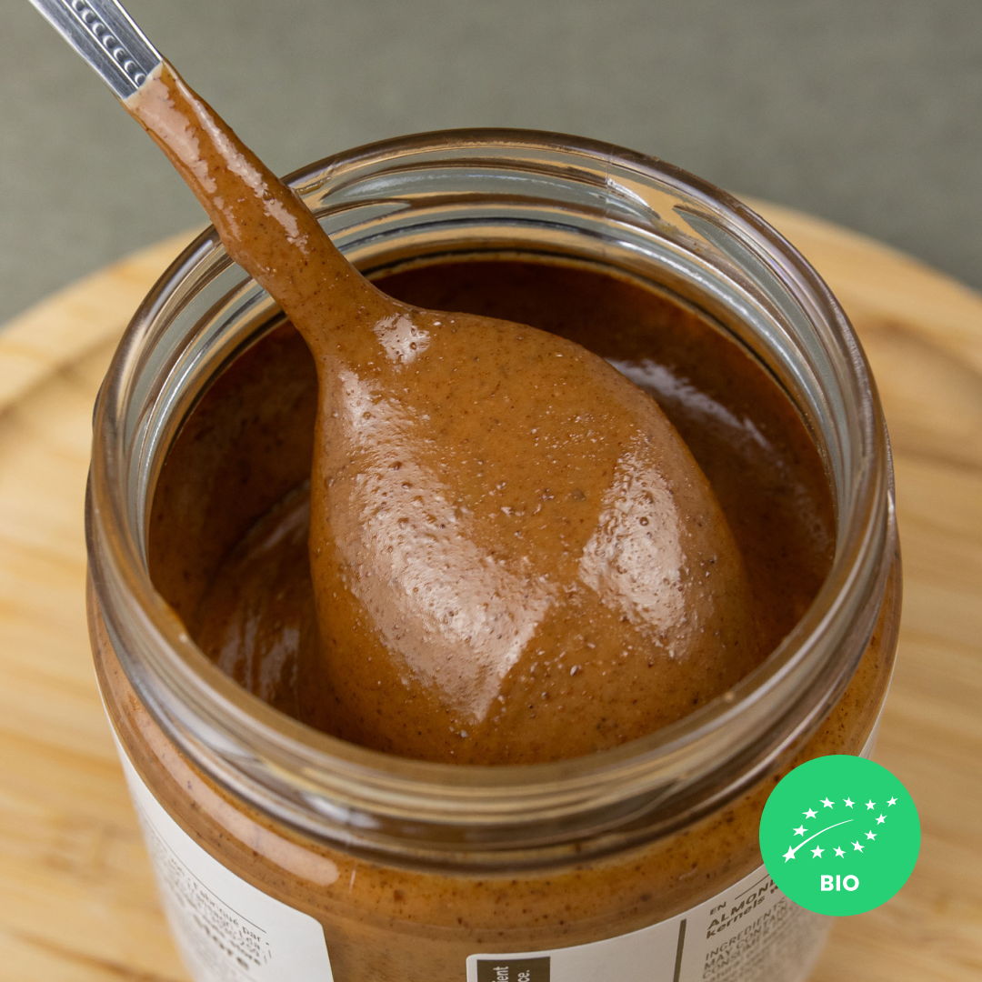 ALMOND • with skin. creamy paste of roasted kernels. no additives. organic.