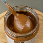 ALMOND • with skin. creamy paste of roasted kernels. no additives.