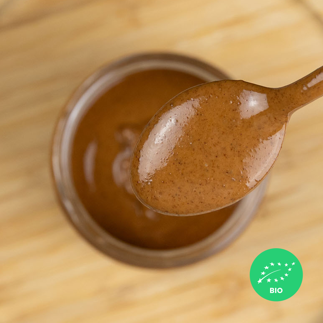 ALMOND • with skin. creamy paste of roasted kernels. no additives. organic.