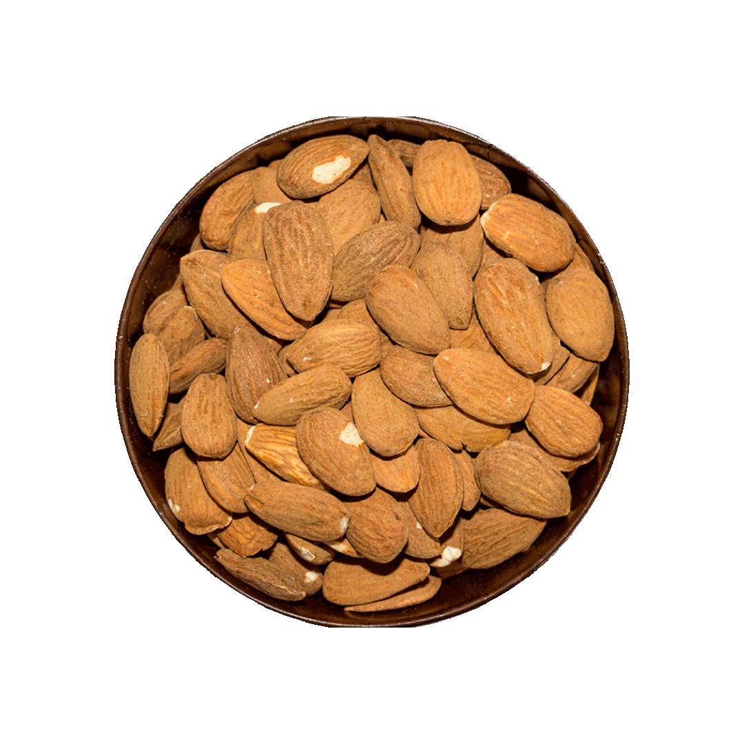 Almonds in a bowl on a black background
