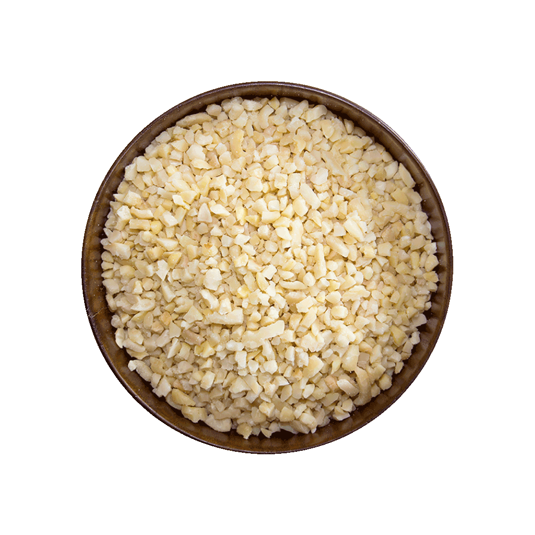 Wooden bowl filled with chopped almonds on a black background