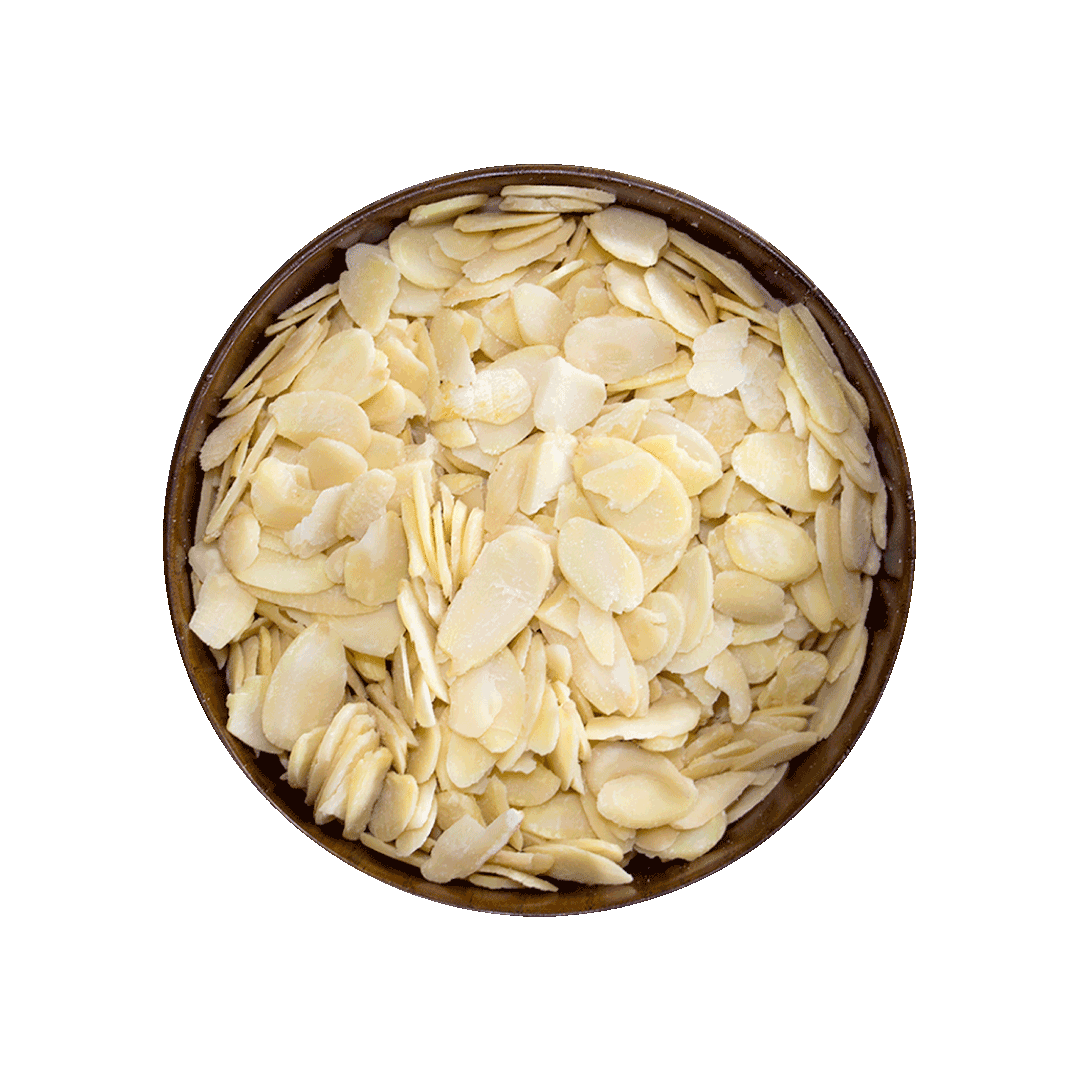 Bowl of sliced almonds on a black background