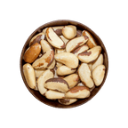 Bowl of Brazil nuts on a black background