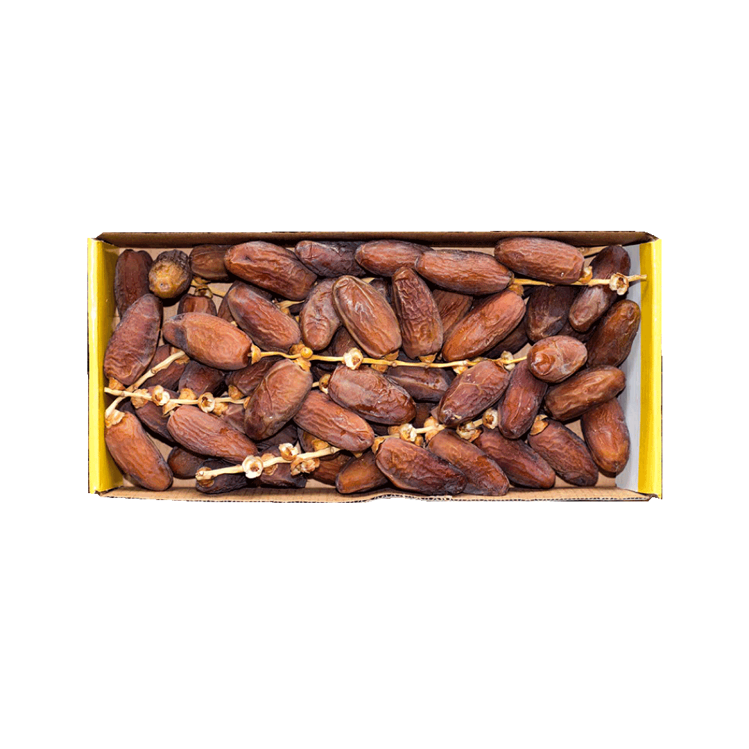 Box of dates on a black background