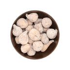 Dried figs in a brown bowl on a black background