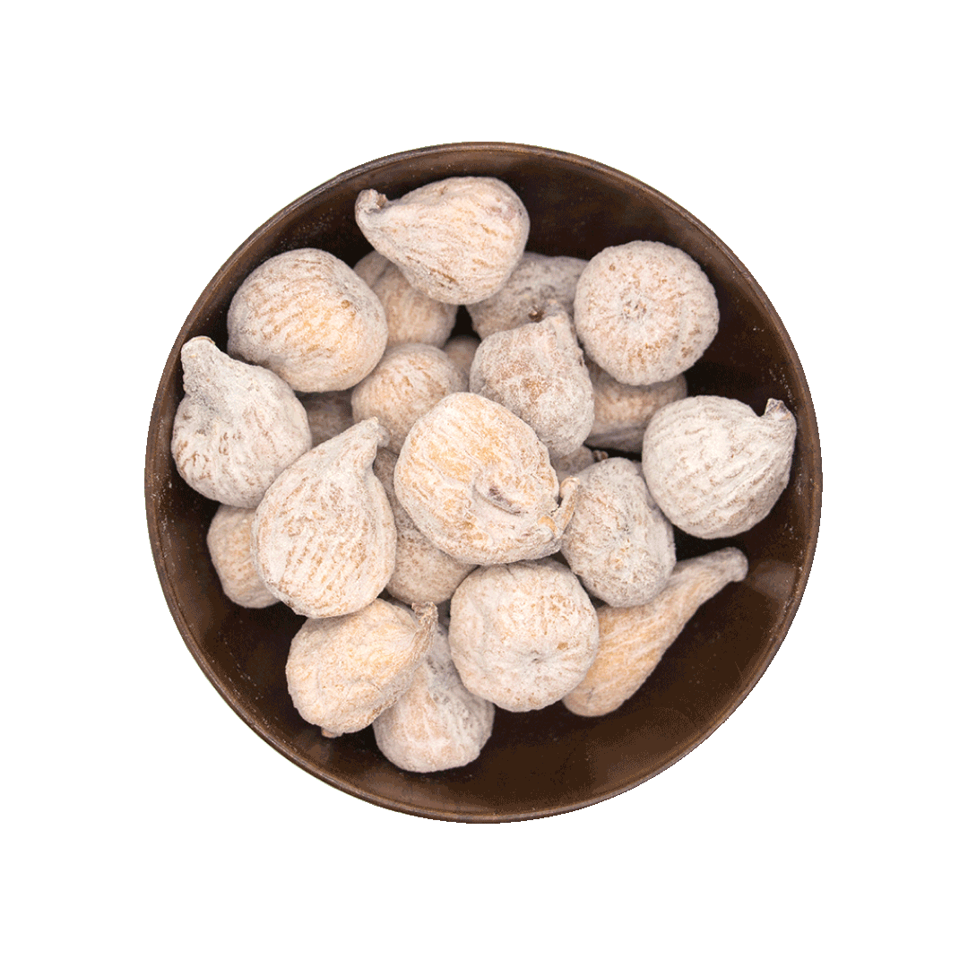Dried figs in a brown bowl on a black background