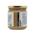 300g glass jar of hazelnut spread with a label on a black background