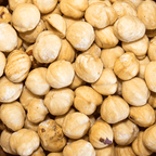 Close-up of a pile of roasted hazelnuts