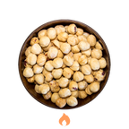 Bowl of roasted hazelnuts on a white background with a flame icon.