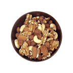 Assorted nuts in a bowl on a black background