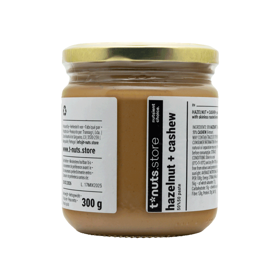 300g glass jar of hazelnut and cashew spread with a visible label on a black background