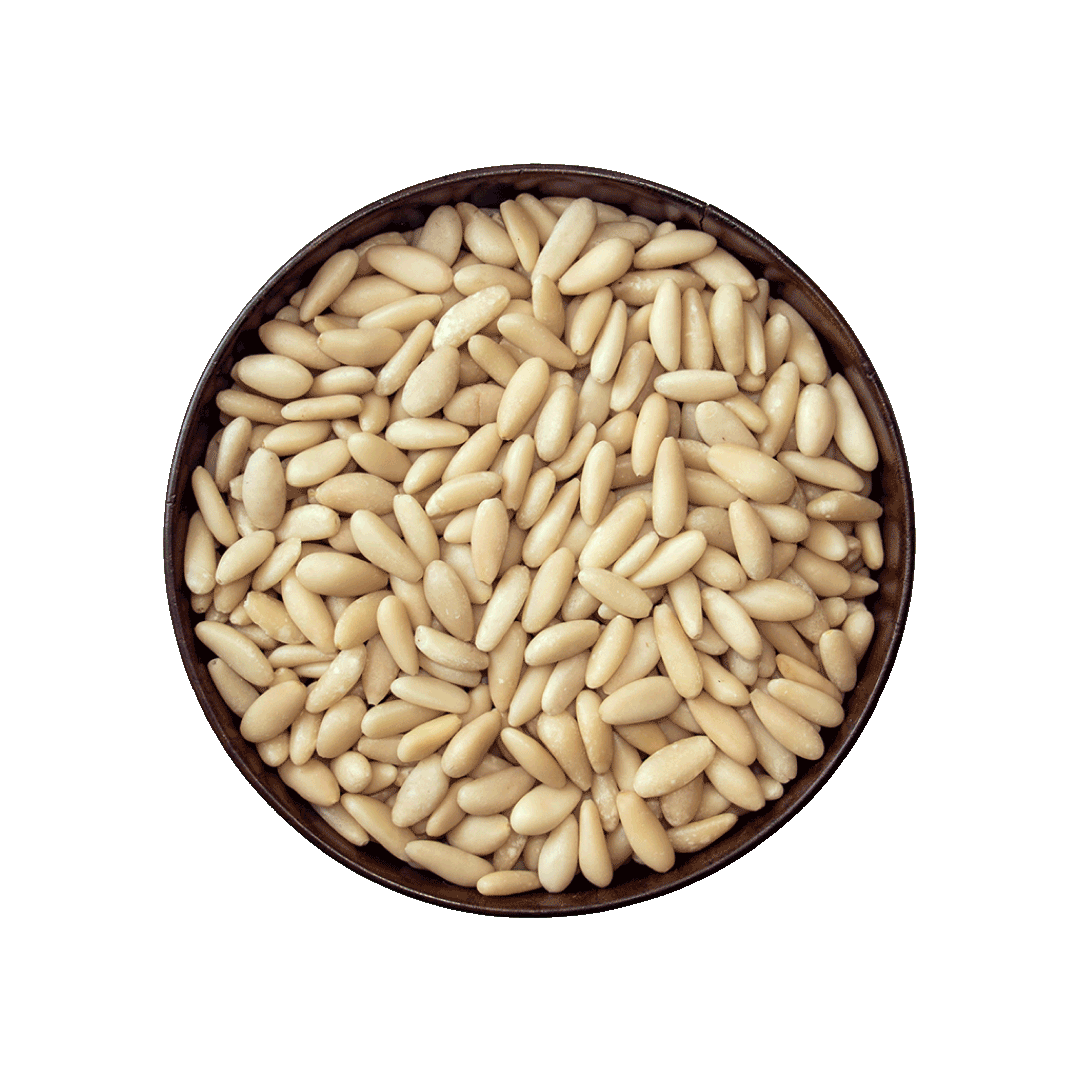 Pine nuts in a wooden bowl on a black background