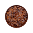 bowl filled with raisins on a black background